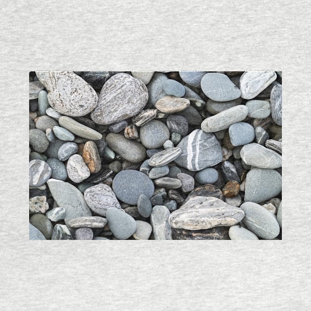 River stones in typical random pattern and type in New Zealand. by brians101